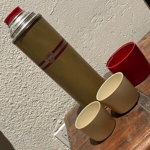 Vintage Yellow Thermos with Red Accents